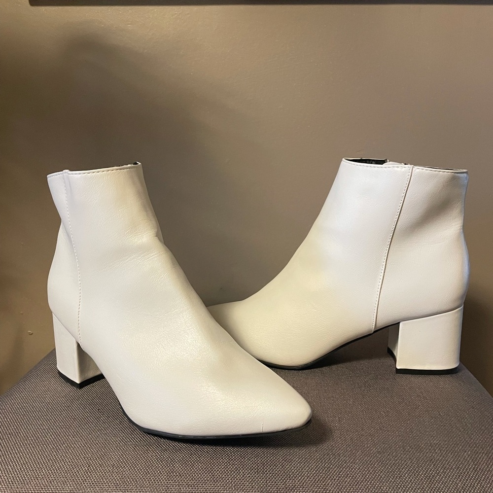 Women's pointed toe block low heel ankle boots.